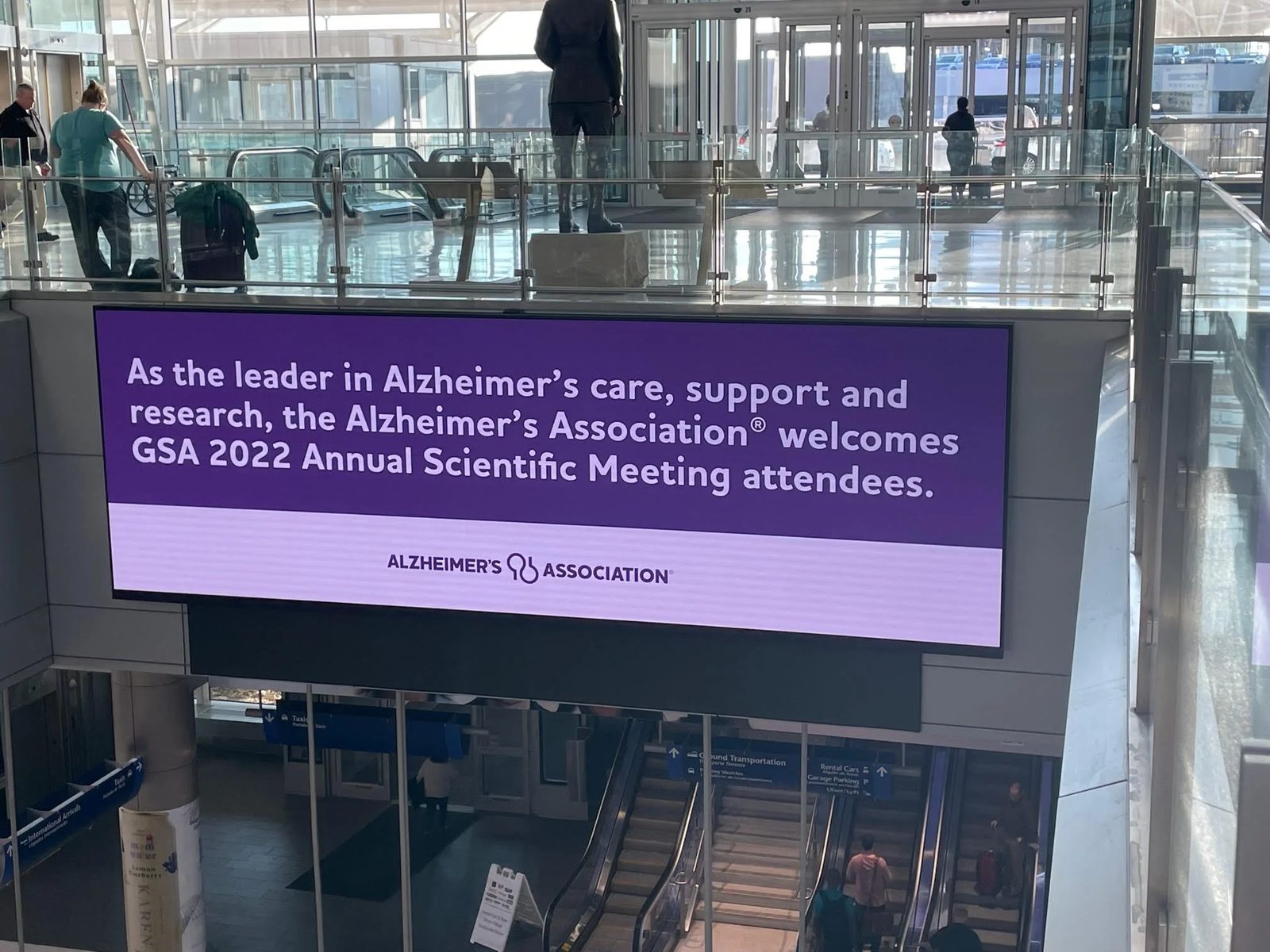 Escalator digital screen welcoming GSA 2022 Annual Scientific Meeting attendees